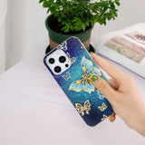 iPhone 15 Pro -kotelo kimalteleva perhoskuvio